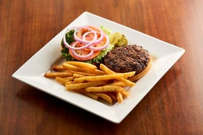 Close-up of hamburger meal served at The IowaStater Restaurant