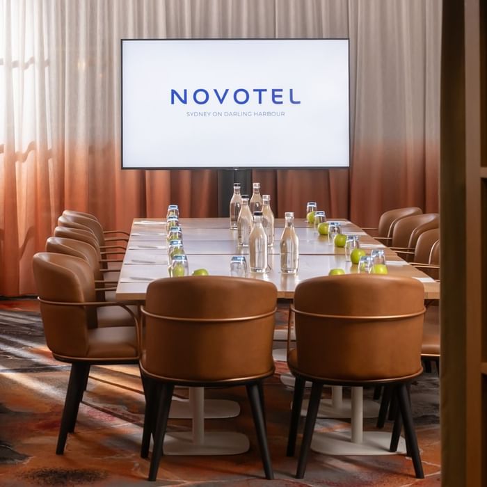 Wide-angle view of The Ternary’s exclusive private dining room set for a corporate event, highlighting stylish interiors and premium tableware.