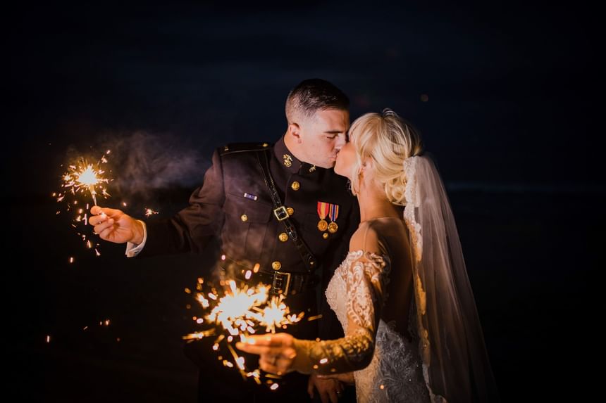 Military couple with sparkerlers 