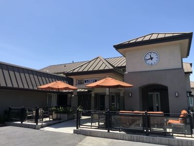 outside seating area in front of a hotel