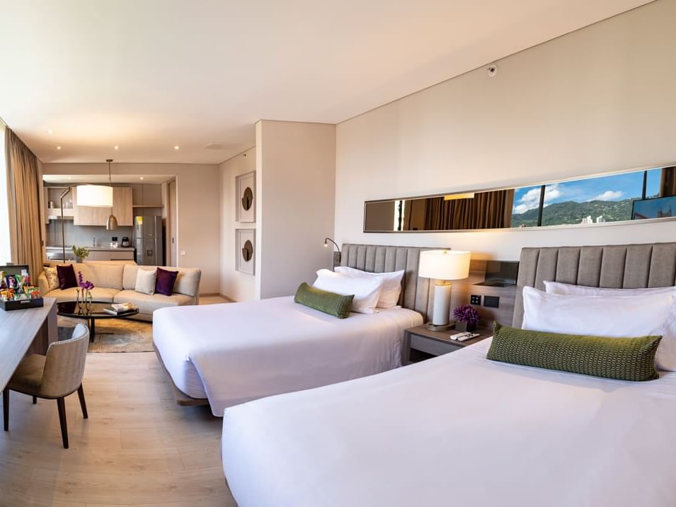 Twin beds in Emerald Queen suite at  Blue Doors Hotels