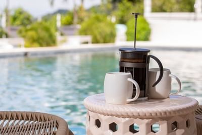 A Coffee table setup by the pool at Retreat Costa Rica