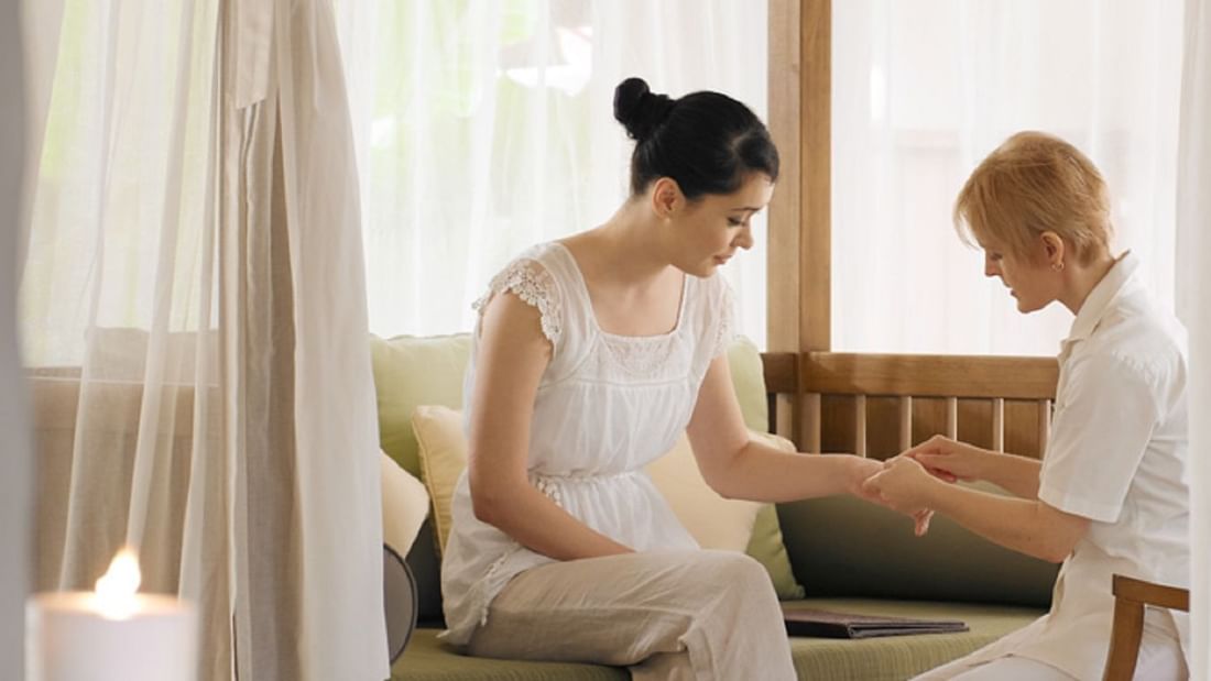 Lady in a consultation session in the Wellness spa at The Banjaran Hotsprings Retreat