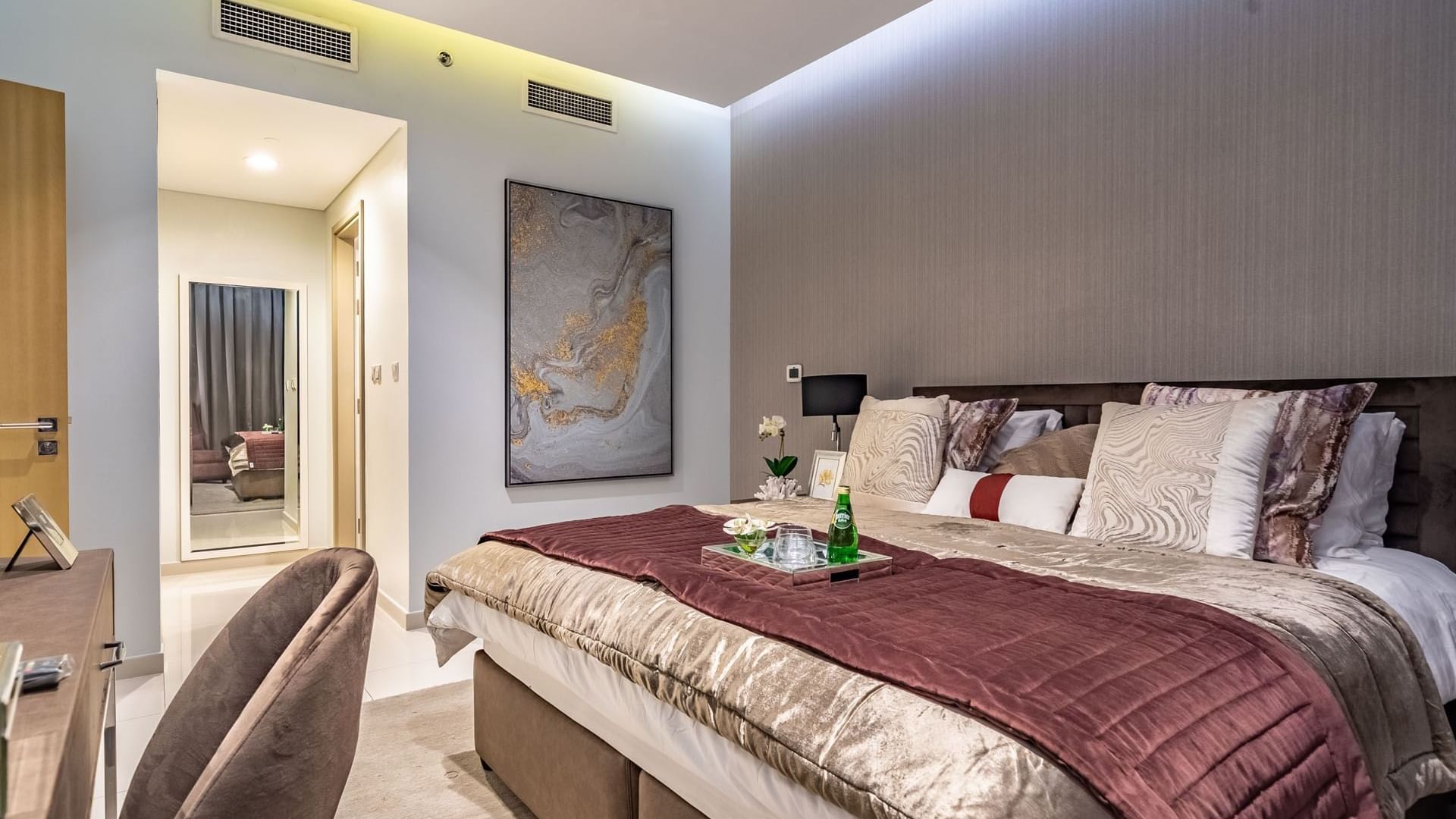 Beverages served on a double bed in a Suite at DAMAC Maison Aykon City Hotel Apartments