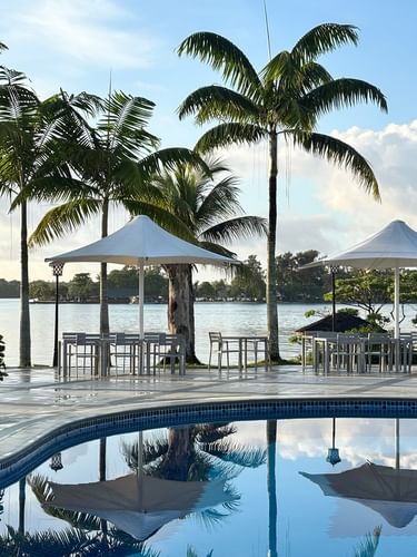 Outdoor dining at Pool Grill Bar near the pool at Warwick Le Lagon - Vanuatu in Efate