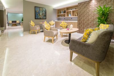 Elegant lobby lounge area with comfy chairs at Eastin Grand Hotel Saigon