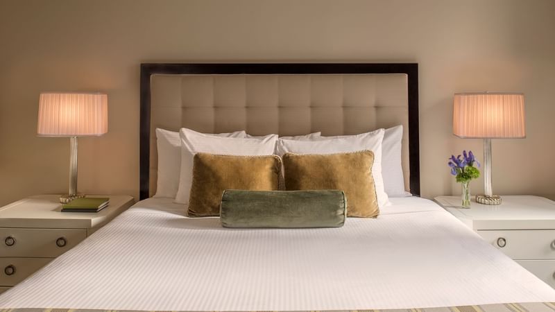 Comfy bed with side tables in Premier Room at Warwick New York