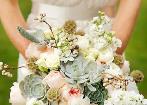 Closeup of a Bride holding a bouquet at Stein Eriksen Lodge