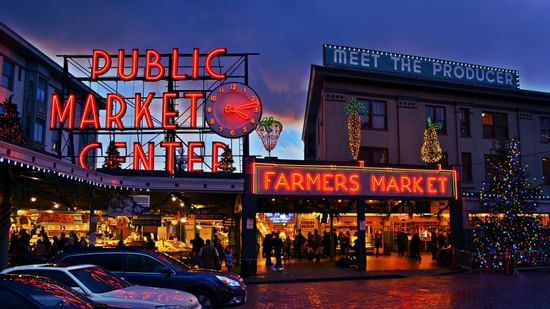 Public Market Center in Seattle lit up at night during Christmas