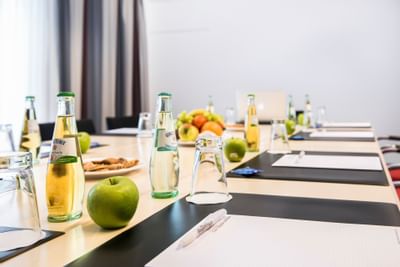 Table setup for meetings in Hotel Collegium Leoninum, Bonn