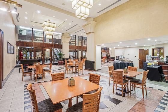 Dining tables arranged in the Restaurant at Federal Hotels International