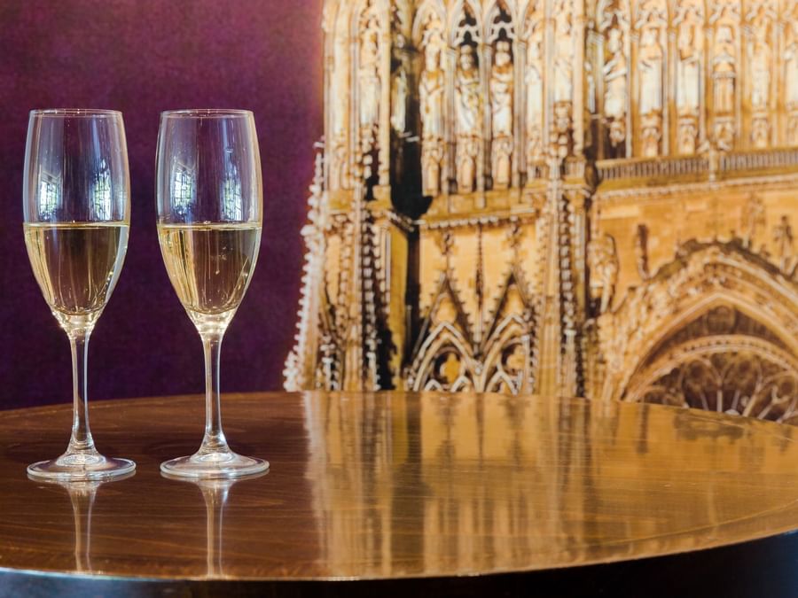 Closeup of champagne glasses at Hotel Qualys Remis Tinqueux