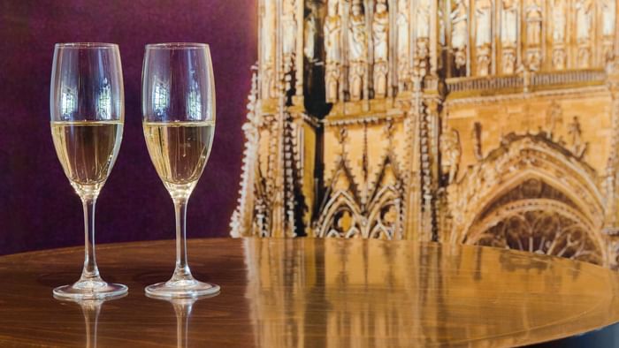 Closeup of champagne glasses at Hotel Qualys Remis Tinqueux