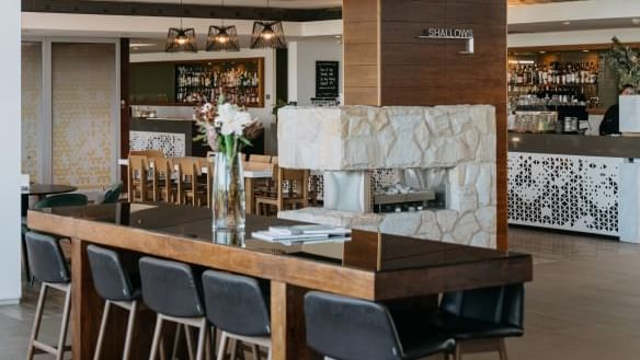 Shallows Bar High Table at Pullman Magenta Shores Resort