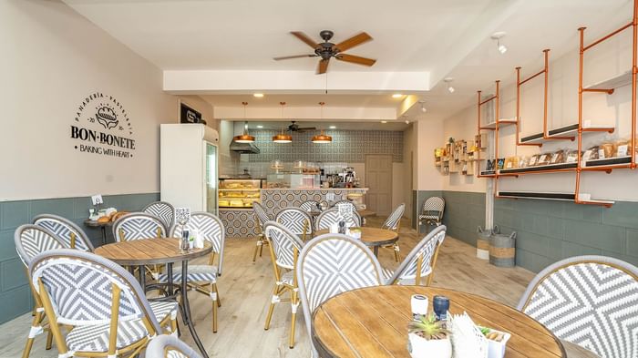 Dining tables arranged in Bon Bonete Bakery at Jungle Vista Boutique Hotel