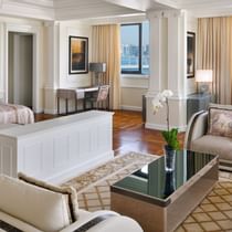 Bed & living area in Modern Imperial Suite at Palazzo Versace