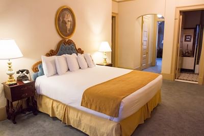 King bed with lamp on nightstand