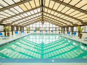 Loungers by the indoor pool at Legacy Vacation Resorts