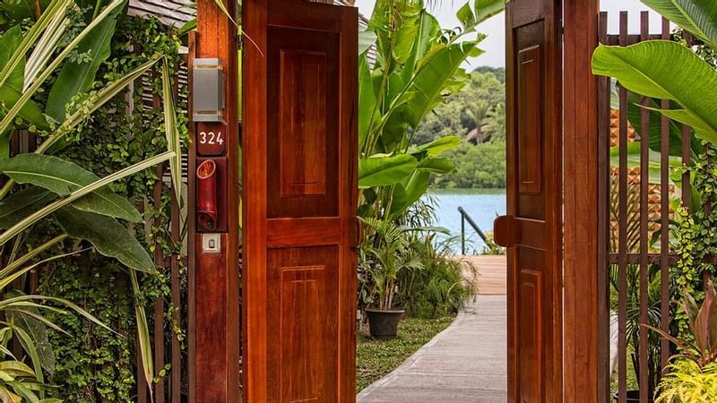 The entrance door of Efate Pool Villa at Warwick Le Lagon 