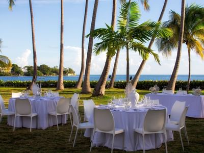 Banquet table setup in a Copa Gardens at Copa Marina Weddings