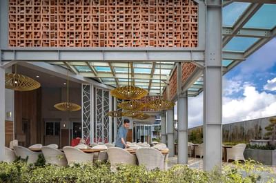 Outdoor dining area in Salt Restaurant & Pool Bar near Eastin Ashta Resort Canggu