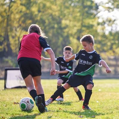 Kids playing at a Football Camp at Falkensteiner Hotels