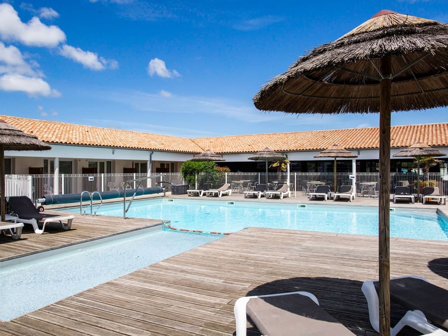 Sunbeds by the outdoor Pool at Hotel de Re