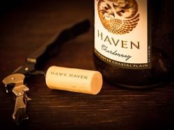 Closeup of a Hawks Haven wine bottle at ICONA Hotel Windrift