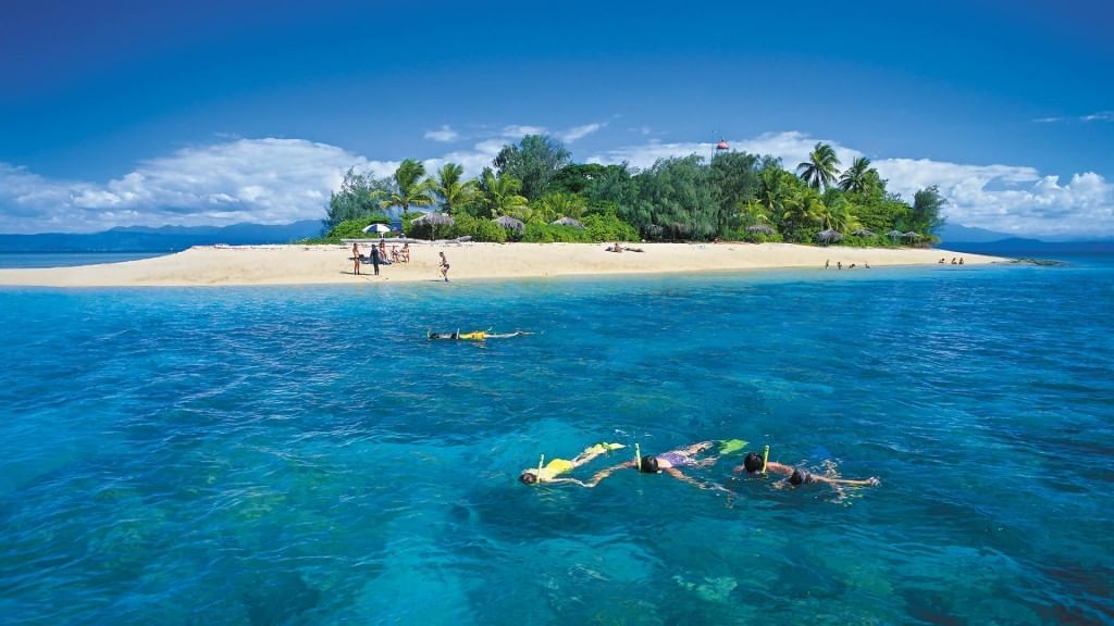 Aerial view of beach near Pullman Palm Cove Sea Temple Resort