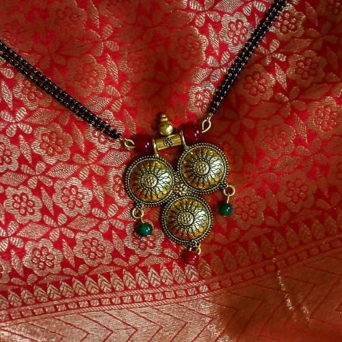 Sacred necklace given to bride in mangalsutra Hindu wedding tradition