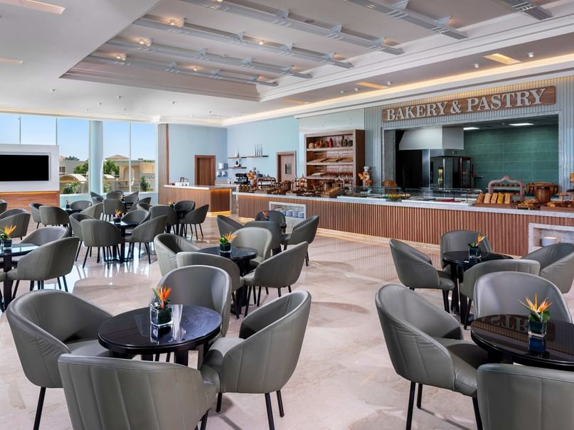 Elegantly furnished restaurant with a bakery station at Pickalbatros Royal Moderna Resort in South Sinai Governorate.