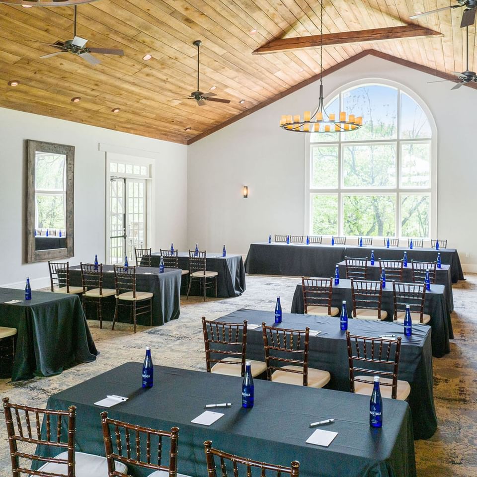 Meeting room with rows of tables in Inn at Willow Grove