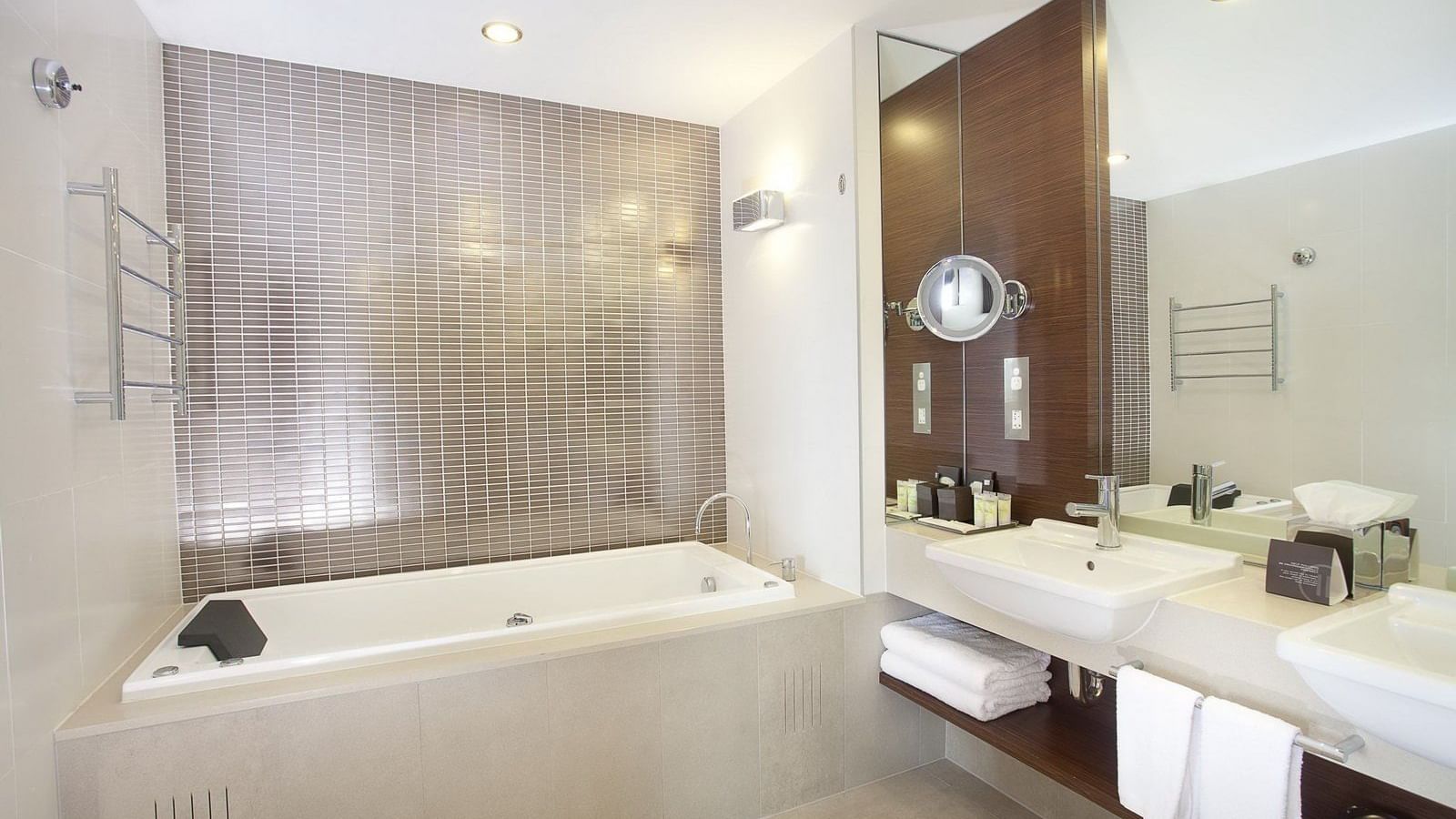 Bathroom facilities in Rooms at Pullman Sydney Olympic park
