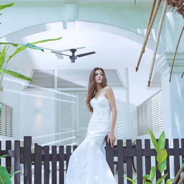 Capture of a bride through plants at Amara Hotels