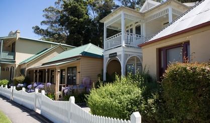 Village waterfront cottage in Strahan at Gordon River Cruise