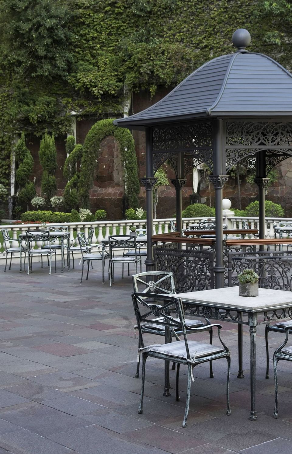 Tables & a Gazebo in a garden at Hotel Emperador Buenos Aires