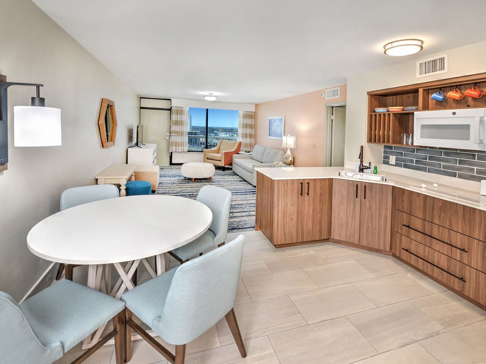 Oceanview kitchen with dining table at Bahama House in Daytona Beach.