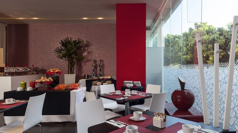 The dining area of a restaurant at Gamma Morelia Beló