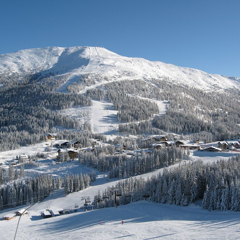 Landscape view of snowy mountains near Falkensteiner Hotels