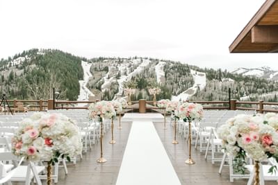 Flower decor on the walkway to aisle at Stein Eriksen Lodge