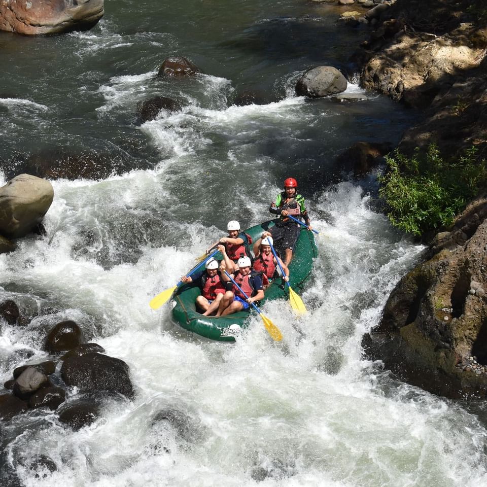 People rafting on the river near Hideaway Rio Celeste