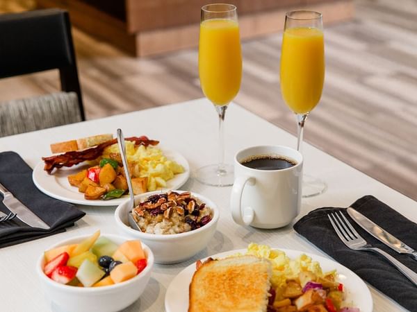 Executive Lounge with dining table, chairs, food and drinks