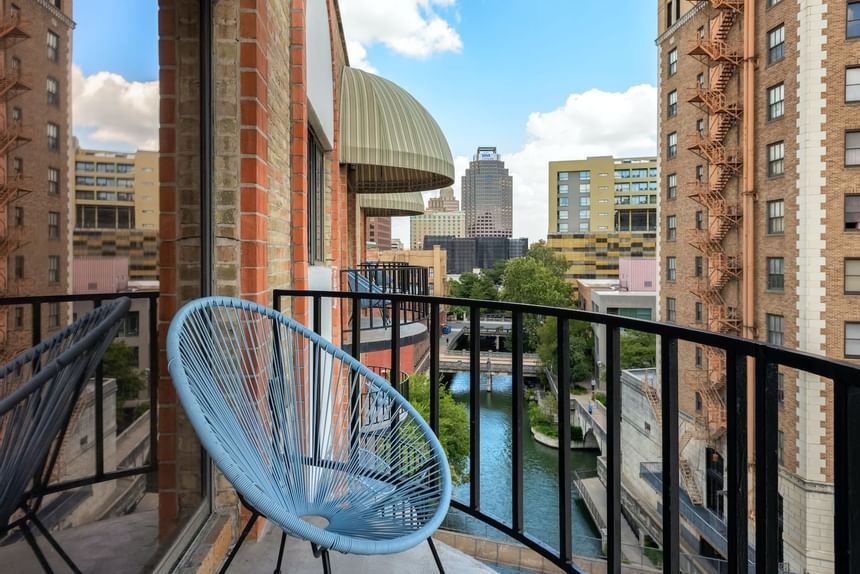 Balcony area with a chair at The Riverwalk Plaza Hotel