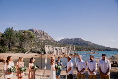 Outdoor Wedding ceremony on the beach at Freycinet Lodge
