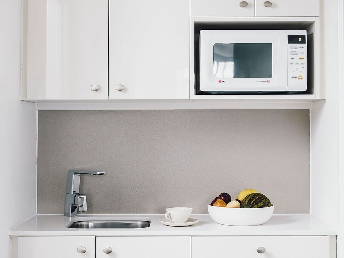 Kitchenette in Studio Room with 2 Single Beds at Quay West Suites Melbourne