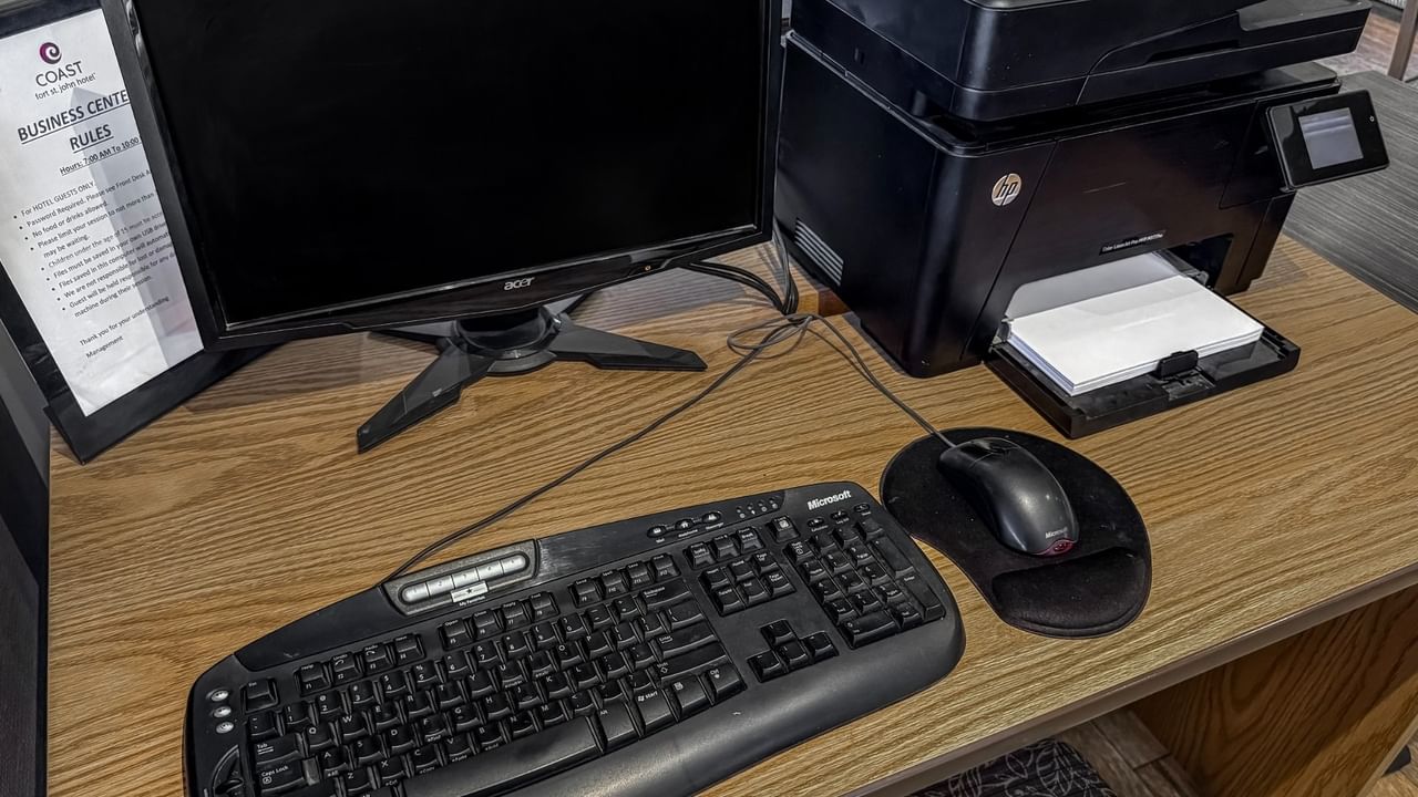 Hotel business centre with computer and printer
