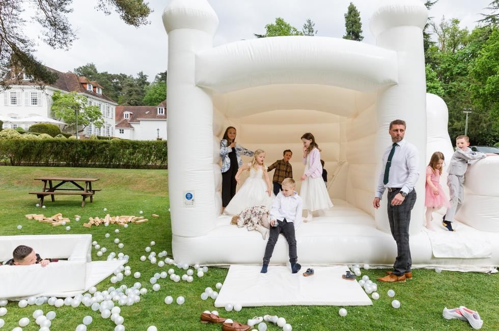 bouncy castle at wedding at gorse hill, surrey