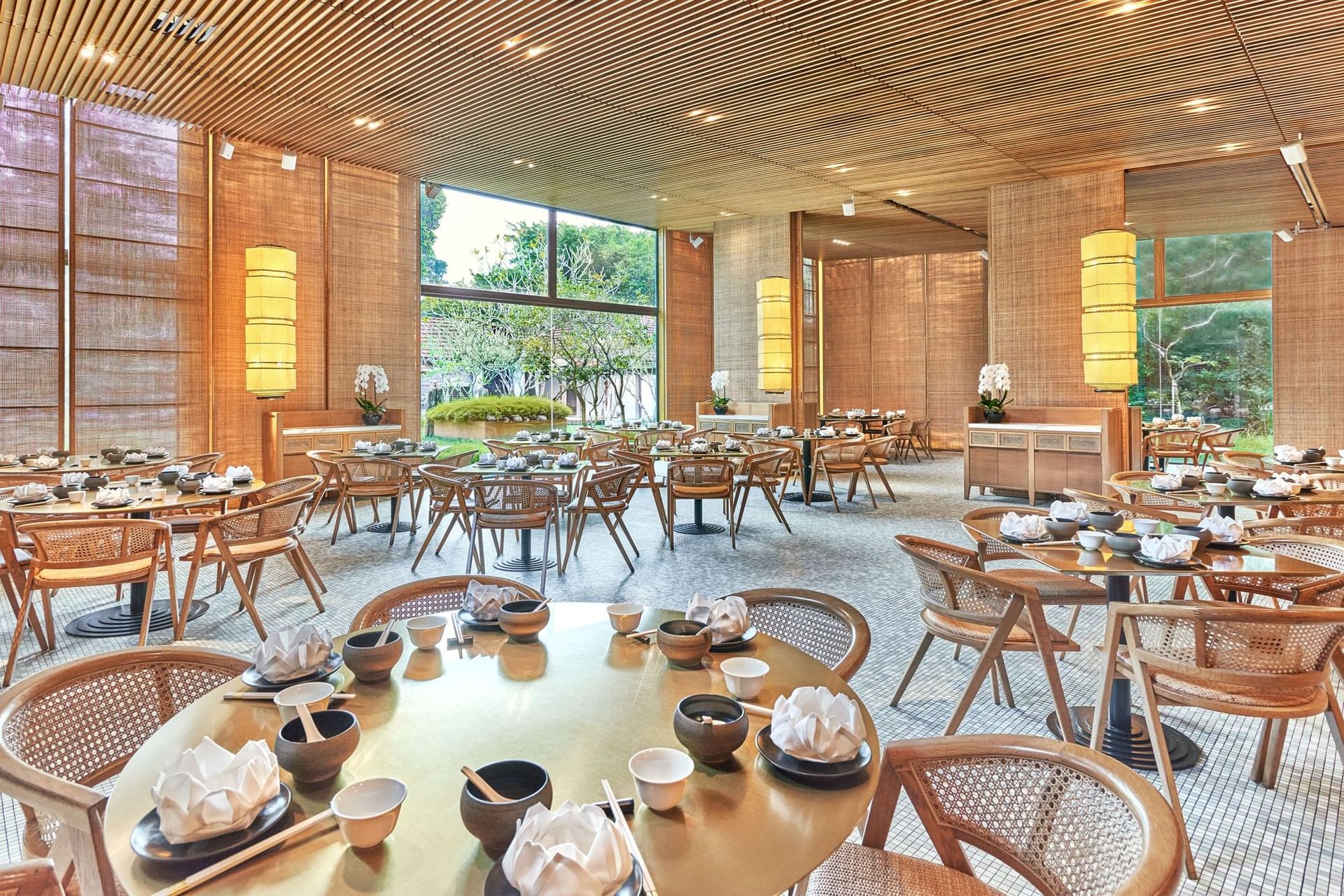 Image 8: Wooded interior with Well-arranged dining tables in Min Jiang by Dempsey at Goodwood Park Hotel