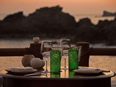Dining table set-up with ocean view at Cala de Mar