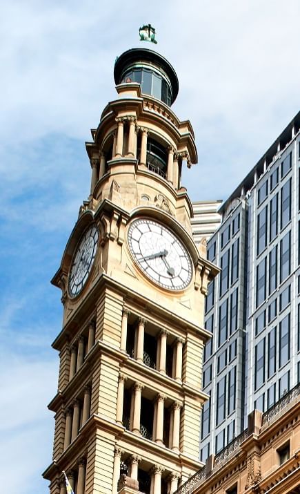 Low angle shot of the clock tower near  Fullerton Sydney